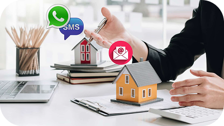 Property sales discussion with model homes and WhatsApp, SMS, and email communication icons
